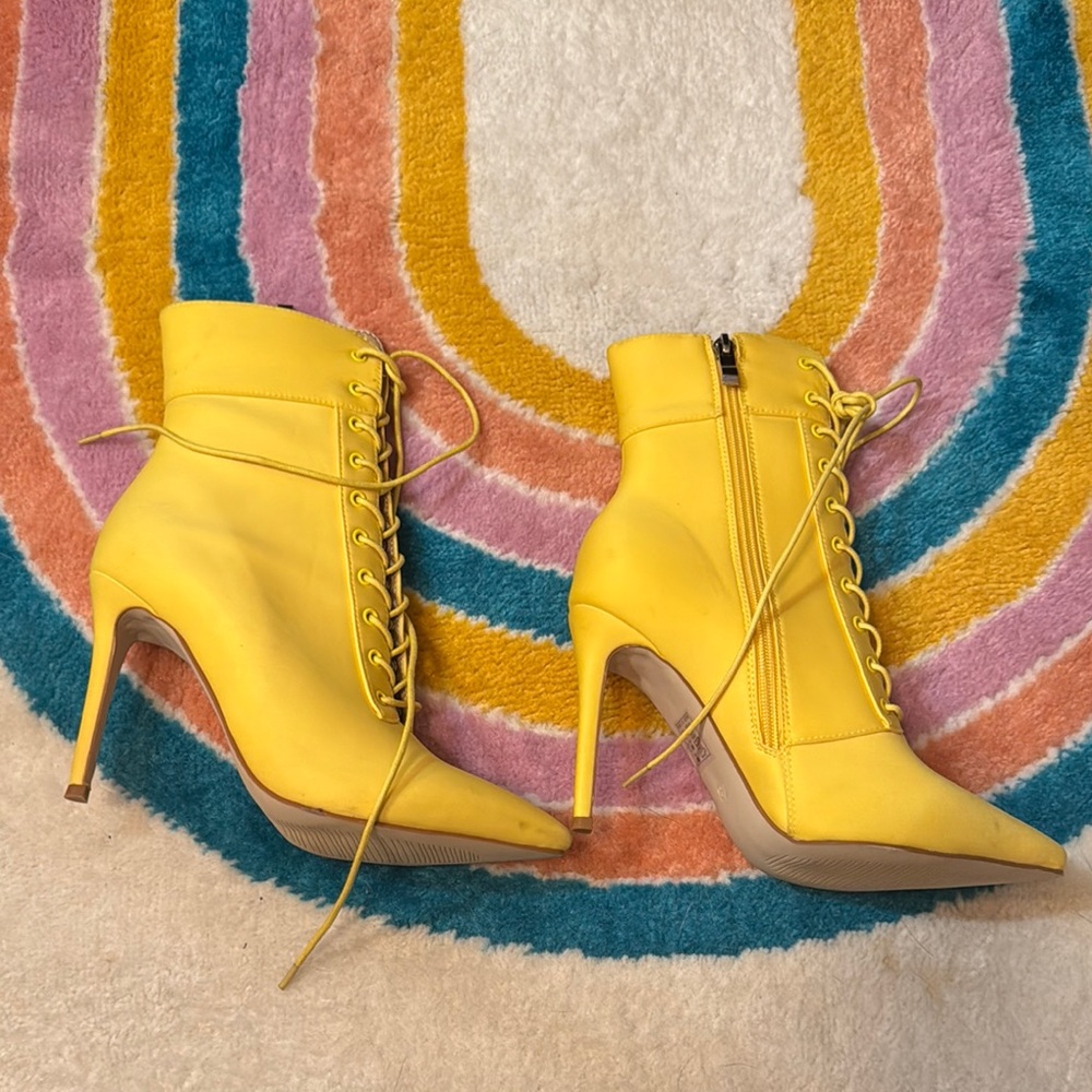 Yellow Heeled Boots with Lace-Up Design